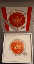 RED & GOLD COLOURED CANADIAN