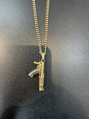 Gold tone rifle gun - gold,