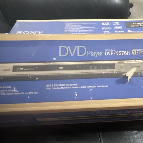 Dvd player plays - -,