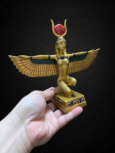 Golden winged isis statue - winged,