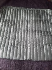 A quilted bed runner measuring