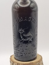 Vintage Black Glass BRIGHTON Beer Bottle Findalater Mackie STAG PICTORIAL 1890's