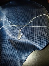 Wind instrument pendant with