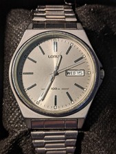 ⌚ LORUS BY SEIKO DAY/DATE 100m GENTS WATCH  V743-0A10 NEW BATTERY