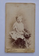 CDV OF A CHILD HOLDING A