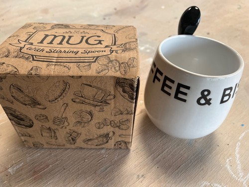 Coffee mug with - , stirring