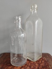 2 Antique Clear Glass Bottles