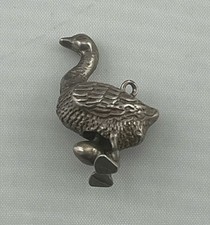 P4.94 Silver Egg Laying Goose Charm Pendant c1970