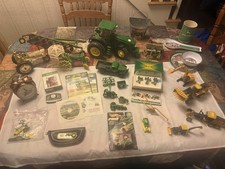 John Deere Lot; Die Cast, DVDs, Belt Buckle, Alarm clock, Odds And Ends ?