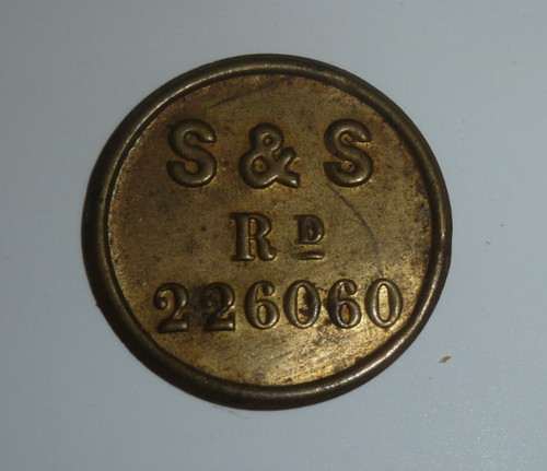 Vintage pressed brass token - brass,