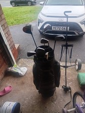 golf clubs and balls and