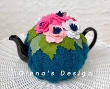 Knitted tea cozy cover blue
