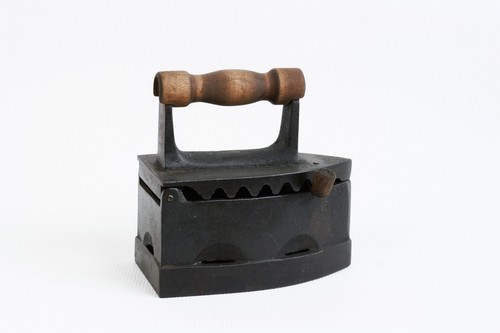Antique coal iron old cloth