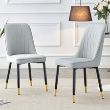 Light gray dining chairs and