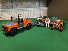 BRUDER LAND ROVER with TRAILER, SNOWMOBILE and QUAD BIKE with MAN