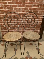 2 steel spiral wicker chairs