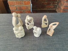 Set of  six  hand carved
