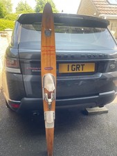 Waterski.  Lapstrake Competition Slalom Waterski. Classic Vintage Ski.