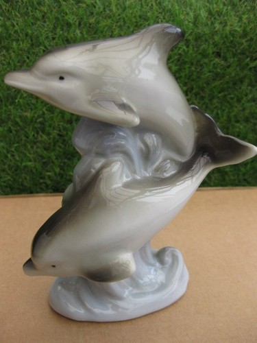 Two dolphins playing ornament - playing,
