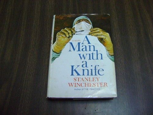 Man with knife by - with,