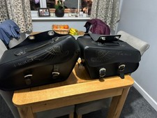 Held cruiser saddle bags