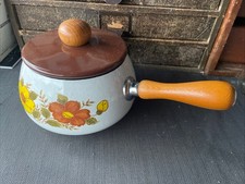 Vintage enamel saucepan flower