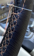 BLACK LEATHER STEERING WHEEL