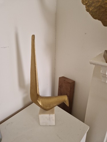 Stylised bird sculpture made