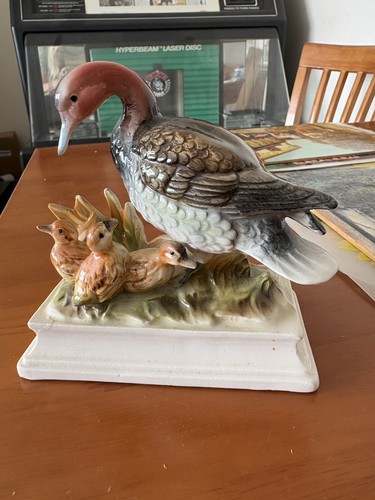 Ceramic mother goose and - mother,