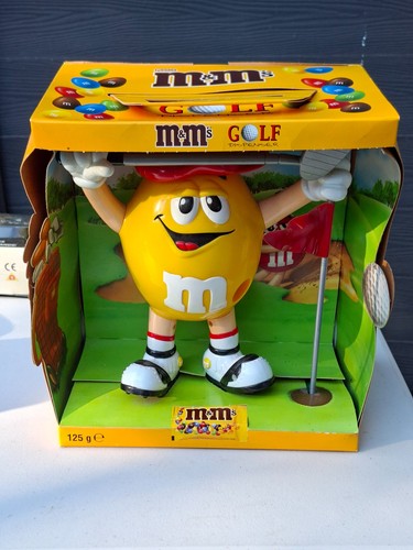 M yellow peanut golf - m&ms,