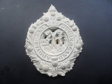 PLASTIC CAP BADGE ARGYLL AND SUTHERLAND