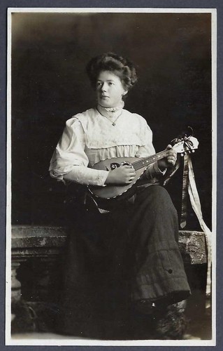 Woman with mandolin real - -,