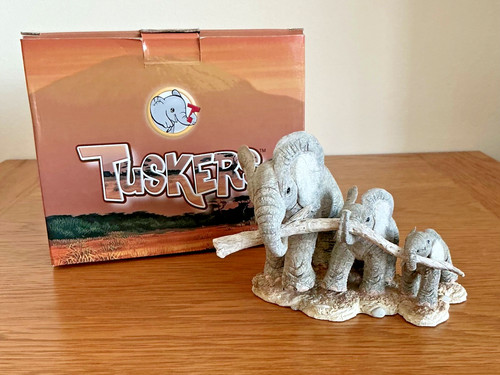 Tuskers elephants helping - tuskers,