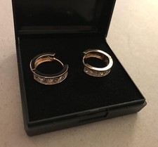 Huggie Earrings. 18ct Gold on