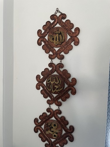 Brown and gold plastic islamic - and,