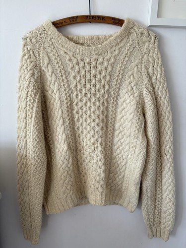 Hand knitted aran - hand,