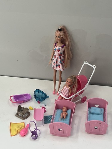 Barbie baby dolls with cots - with,