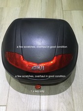 Givi top box, a full face helmet fits inside, mounting plate NOT available