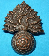 THE ROYAL FUSILIERS CITY OF LONDON REGIMENT CAP BADGE BRASS LUGS K/C GENUINE