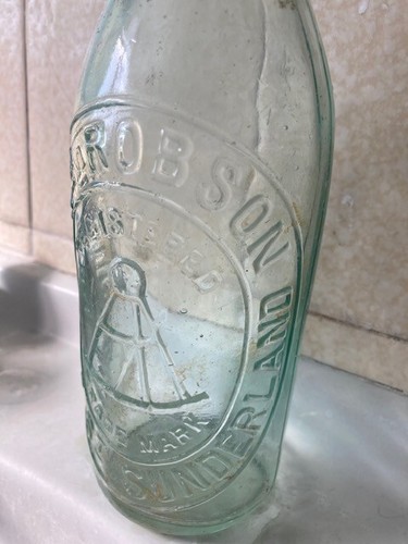 Antique glass beer bottle
