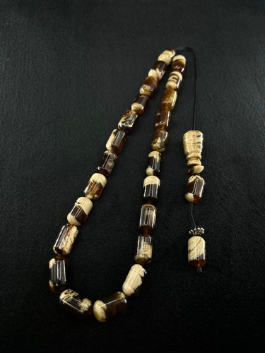 Black zebra amber - black,