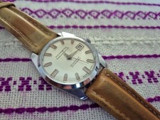 RARE VINTAGE "HOLCANSTAR"SUPERMATIC 27 CALENDAR WATCH.