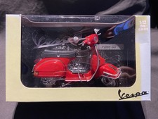 NewRay 1:12 Diecast Model of a Vespa P200E in its original box. Good used order.