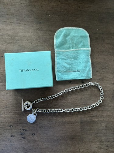 Please return tiffany - to, &