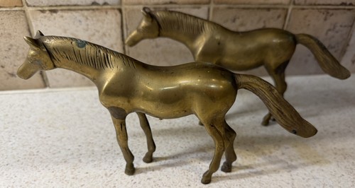 Vintage medium solid brass - x,