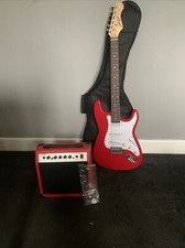 electric guitar, Amplifier, 2 Picks, Spare Strings, Bag