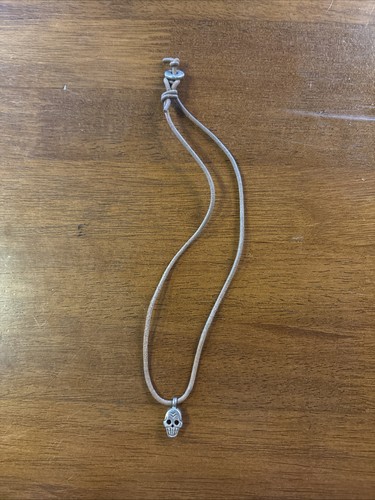 And skull necklace - and,