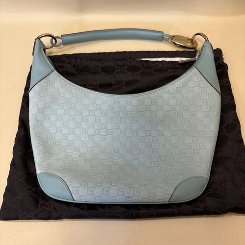 Gucci light blue logo - light,