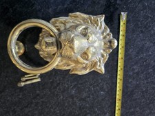 Carlisle Brass Lions Head Door