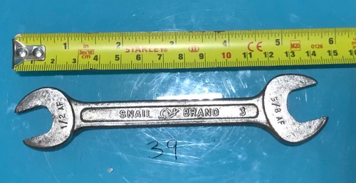Vintage snail brand - brand, spanner
